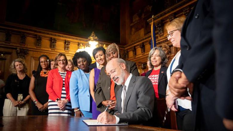 Tom Wolf signs an executive order, making changes to executive branch agencies and programs to better target gun violence in Pennsylvania.